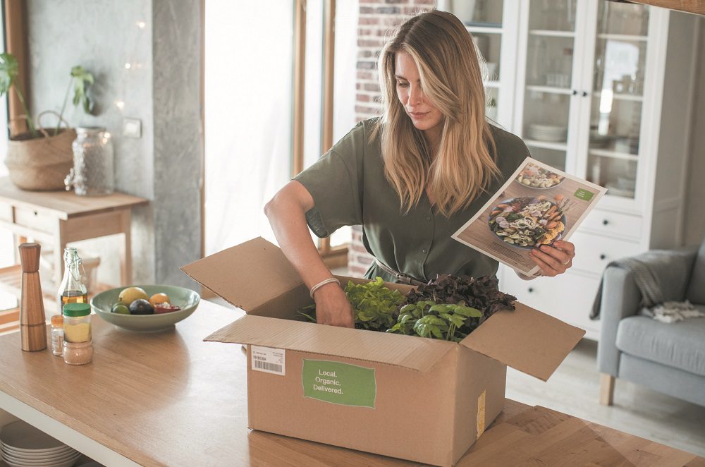 Woman got package from meal delivery service.