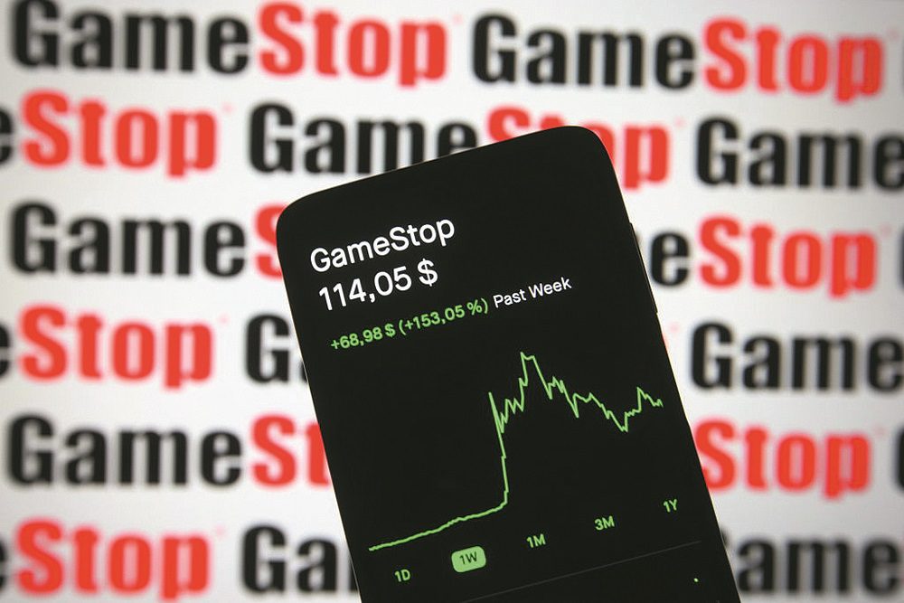 In this photo illustration the GameStop (GME) stock price