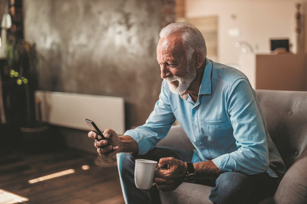 Senior man and his smartphone