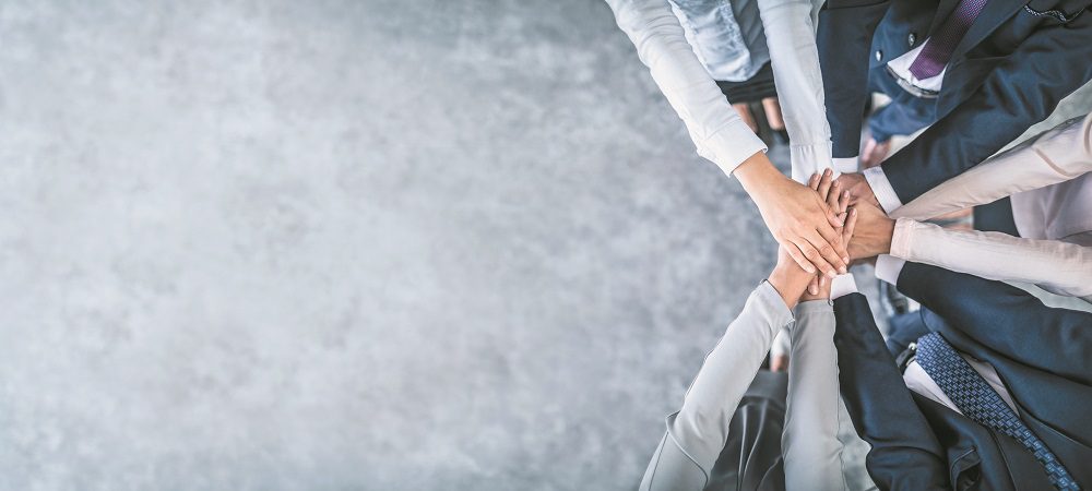 Stack of hands. Unity and teamwork concept.