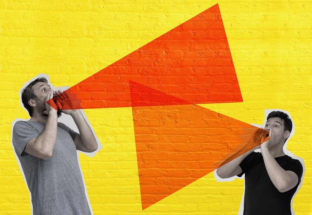 Man and boy screaming on brickwall
