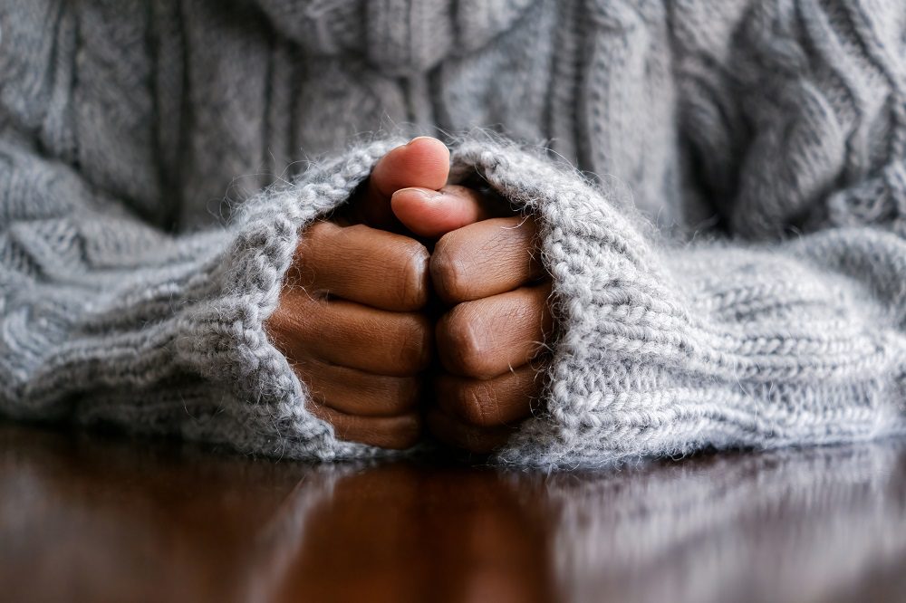 Close-Up of Woman's Hands on Table