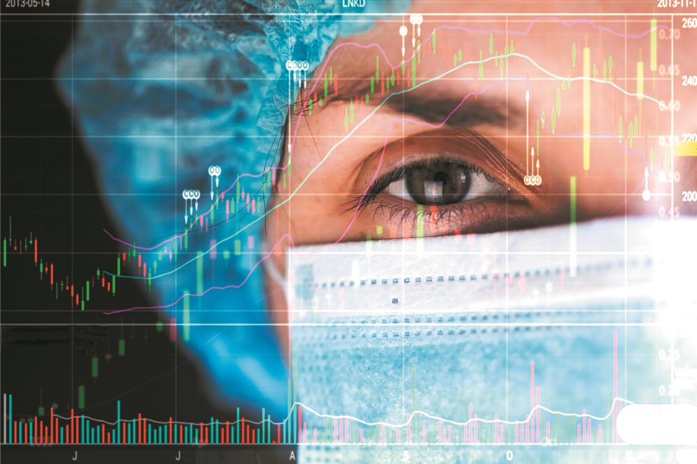 Portrait of a doctor woman on the background of stock charts