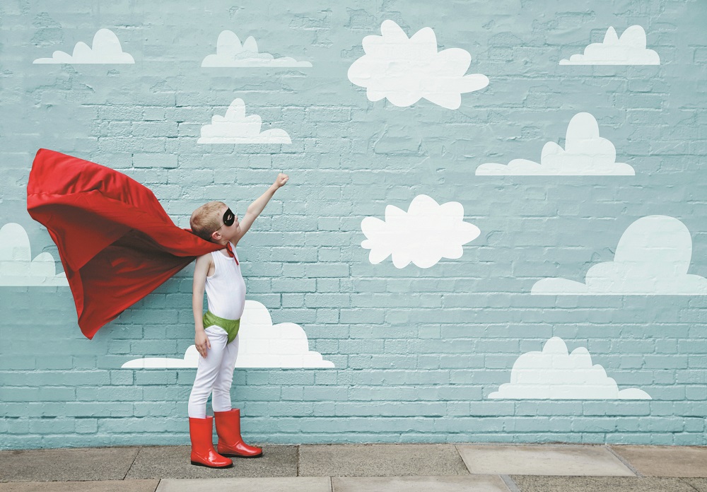 Boy dressed as a superhero