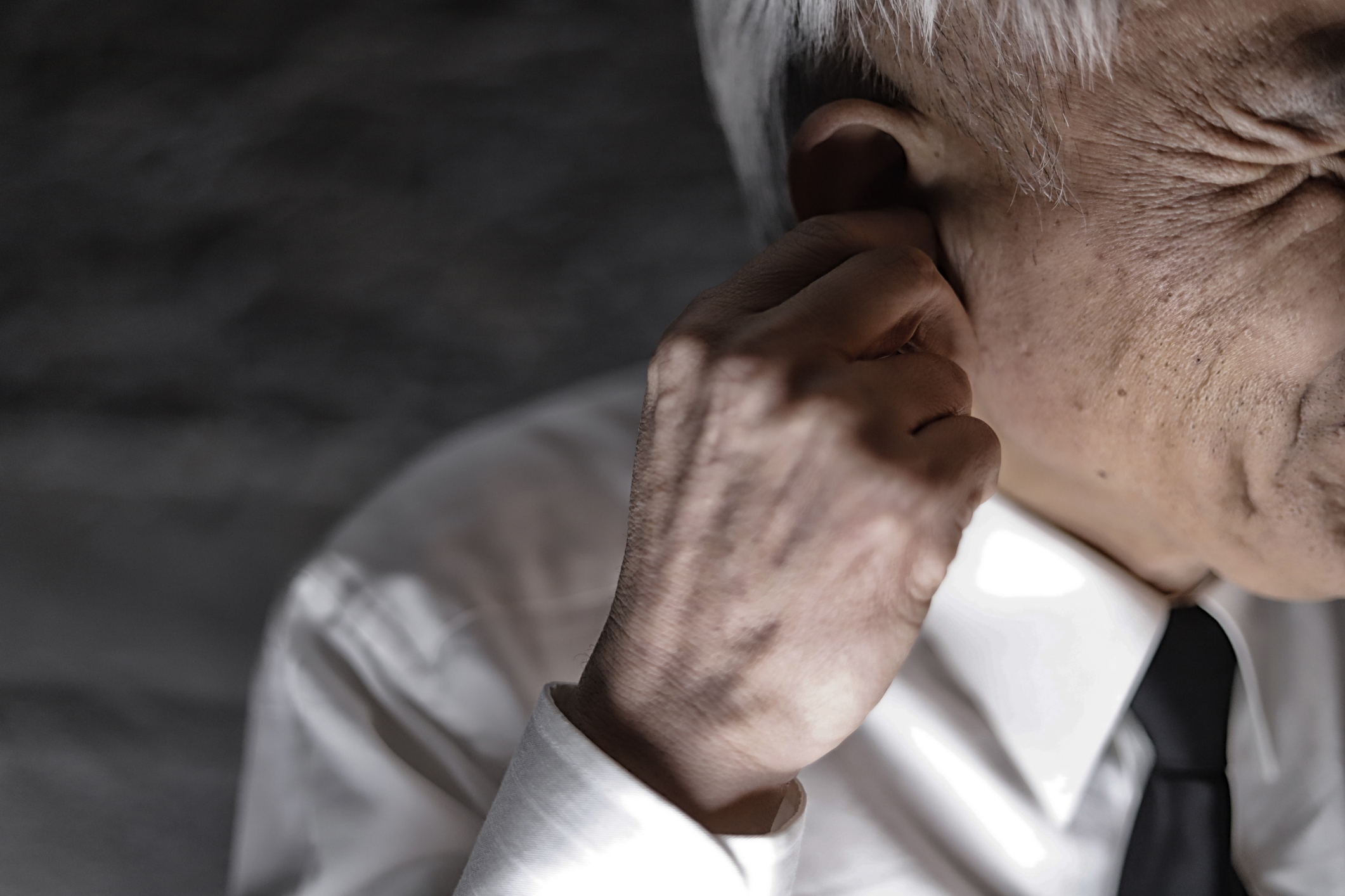 Middle aged man suffering from earache