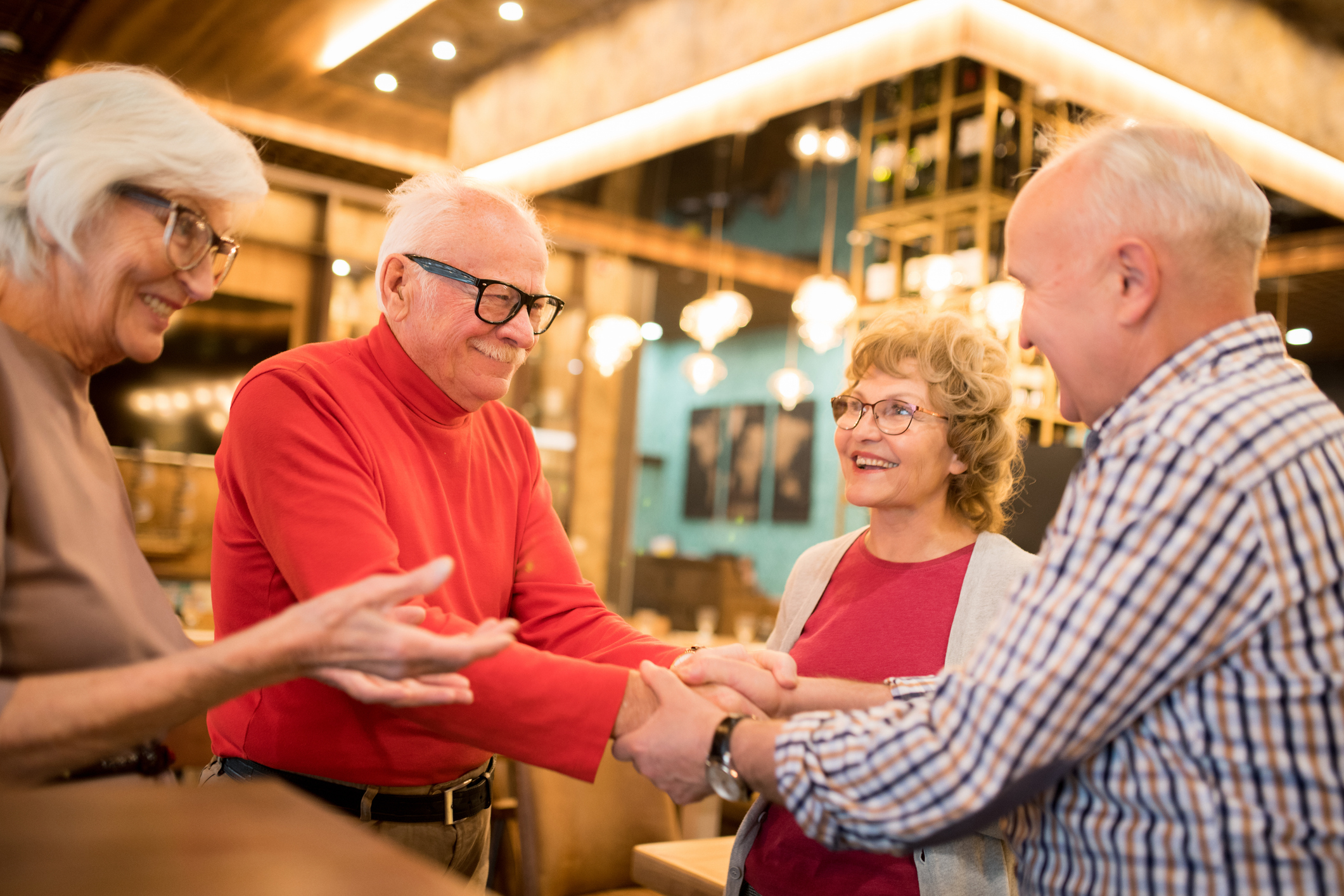 Ladies introducing their husbands to each other