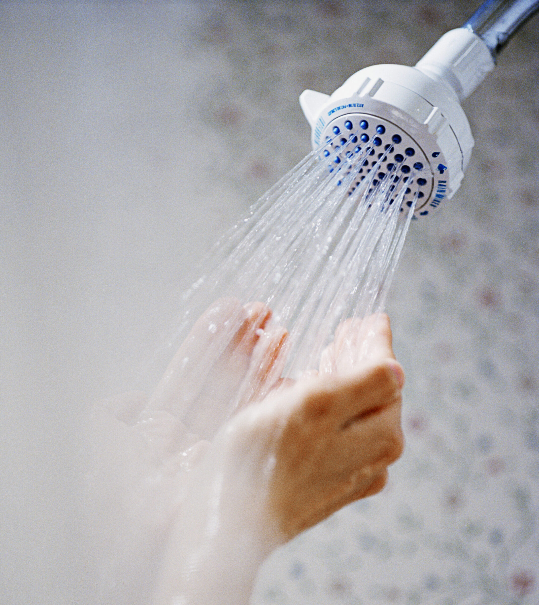 Cupped Hands Under Shower