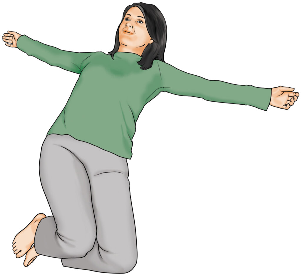 A woman with her arms spread resting her back against the floor ready to bring her hands together and perform a lumbar rotation.