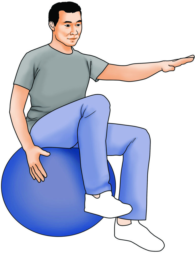 A man seated upon an exercise/yoga ball raises his left arm and right leg performing an opposite sides leg arm lift exercise.